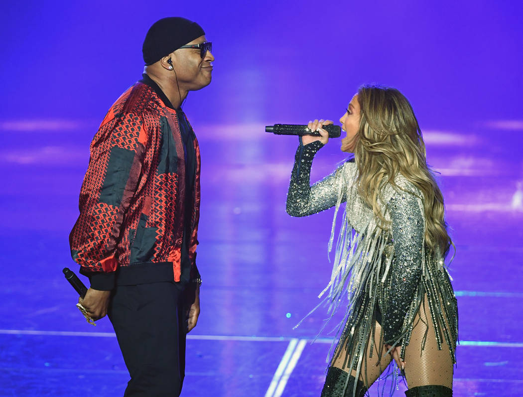 LL Cool J and Jennifer Lopez perform during the finale of her residency, "Jennifer Lopez: All I Have" at Zappos Theater at Planet Hollywood on the Las Vegas Strip, Sept, 29, 2018. (Ethan Miller/Ge ...