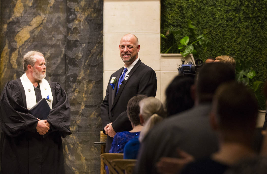 Todd Wienke looks on before the start of his wedding ceremony with Oshia Collins-Waters at Chapel of the Flowers in Las Vegas on Monday, Oct. 1, 2018. Todd was shot three times as he shielded Oshi ...