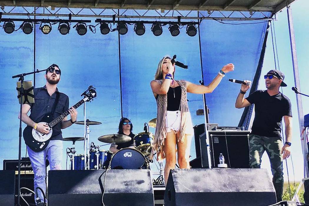 Jase Naron, Shon McKee, Ali Sekkat and Krystal Goddard perform at the Route 91 Reunion at Centennial Hills Park on Saturday, Sept. 29, 2018. (Amy McCaslin)