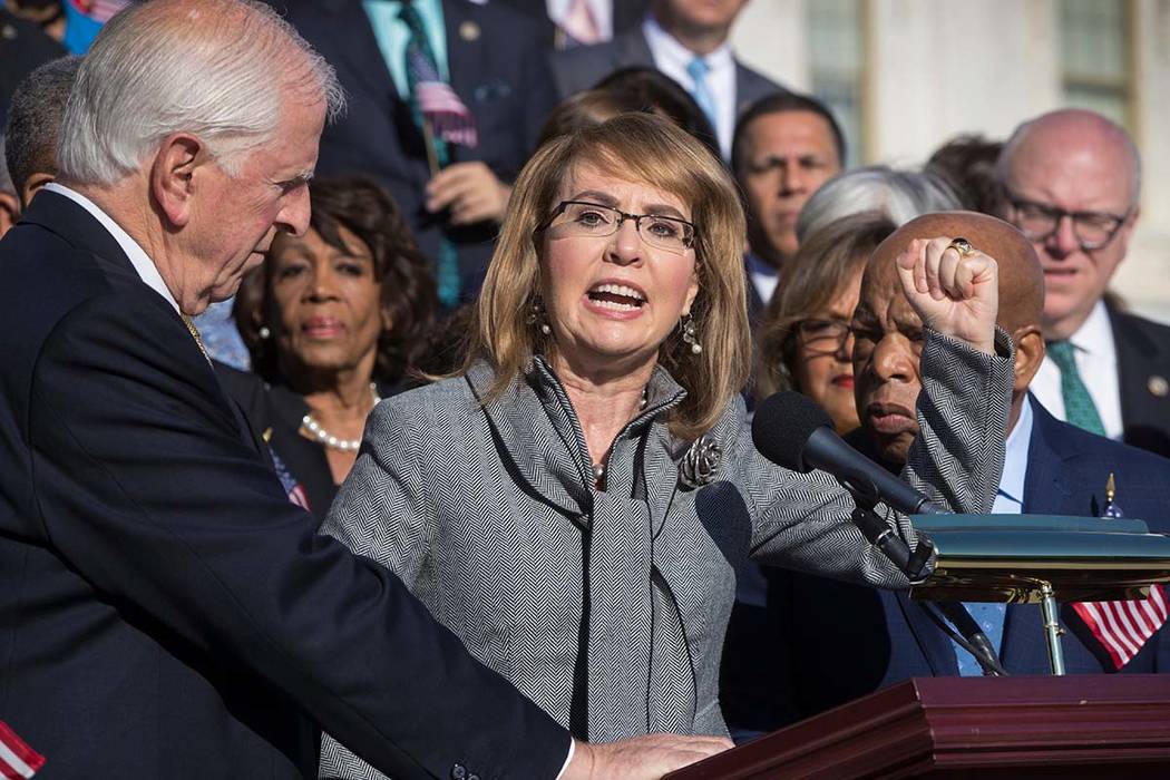 Former U.S. Rep. Gabby Giffords, of Arizona on the House steps at the Capitol in Washington on Wednesday, Oct. 4, 2017. (J. Scott Applewhite/AP)