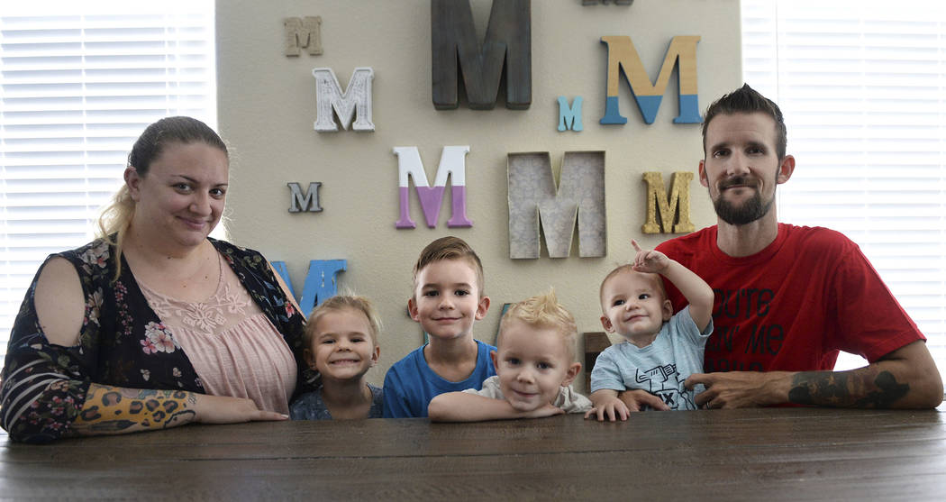 The Matheson family poses for a portrait inside their home in Las Vegas, Sunday, Sept. 30, 2018. Caroline Brehman/Las Vegas Review-Journal