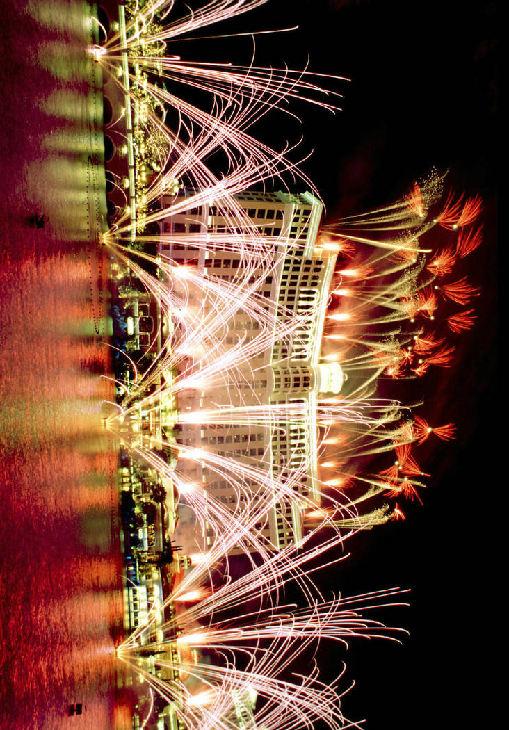 FILE*** Fireworks light up the sky above and around The Bellagio Hotel-Casino on the Las Vegas strip during the grand opening celebration for the casino Sunday, Oct. 18, 1998. (AP Photo/Las Vegas ...