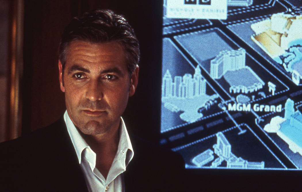 George Clooney stars in Ocean's 11. 2001 Warner Bros.