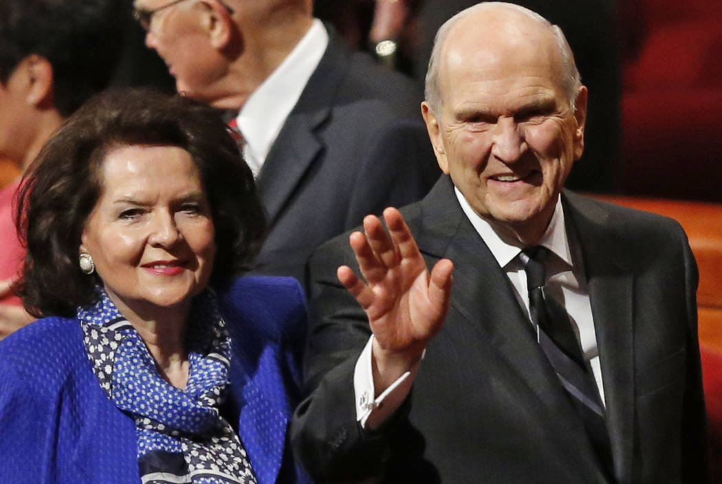 President Russell M. Nelson and his wife Wendy, wave as they leave the morning session of a twice-annual conference of The Church of Jesus Christ of Latter-day Saints Saturday, Oct. 6, 2018, in Sa ...