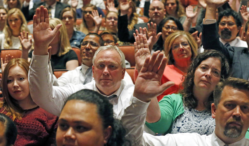 Mormons participate in a long-standing custom called a "sustaining" when Latter-day Saints stand and raise their hands during the twice-annual conference of The Church of Jesus Christ of ...
