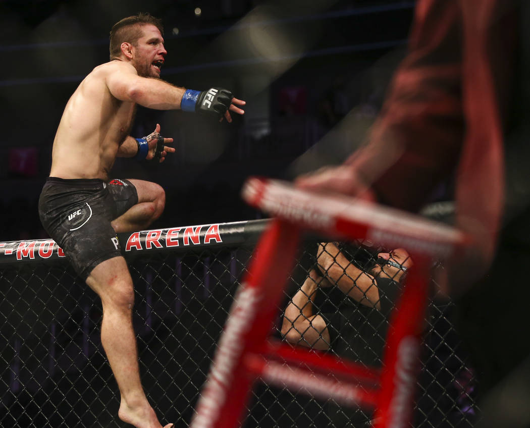 Nik Lentz celebrates his second-round technical knockout over Gray Maynard, not pictured, in their lightweight bout at UFC 229 at T-Mobile Arena in Las Vegas on Saturday, Oct. 6, 2018. Chase Steve ...