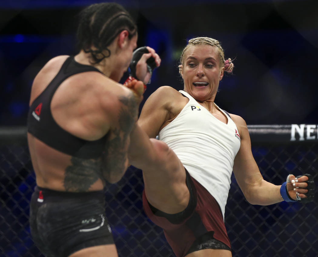 Lina Lansberg, left, fights Yana Kunitskaya during their bantamweight bout at UFC 229 at T-Mobile Arena in Las Vegas on Saturday, Oct. 6, 2018. Chase Stevens Las Vegas Review-Journal @csstevensphoto