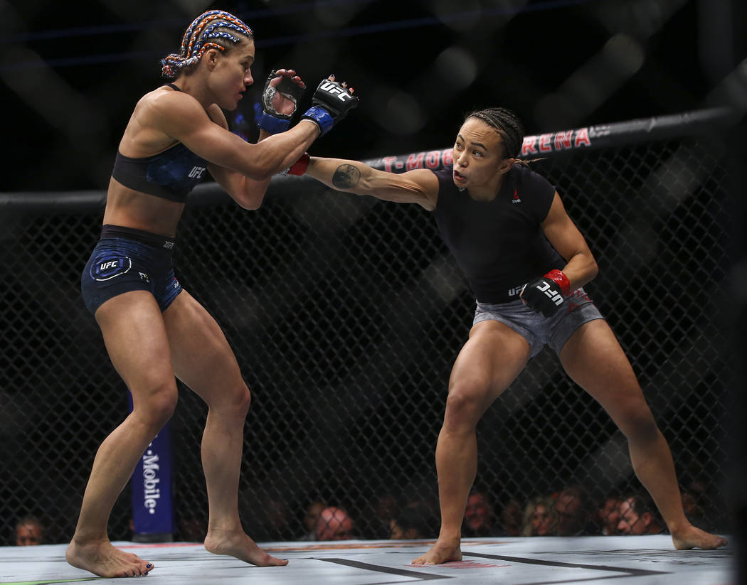 Michelle Waterson, right, fights Felice Herrig during their strawweight bout at UFC 229 at T-Mobile Arena in Las Vegas on Saturday, Oct. 6, 2018. Waterson won via unanimous decision. Chase Stevens ...