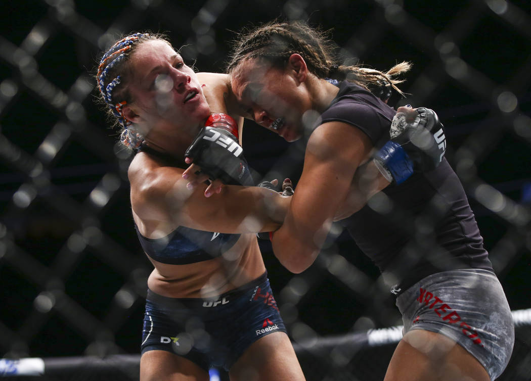Michelle Waterson, right, fights Felice Herrig during their strawweight bout at UFC 229 at T-Mobile Arena in Las Vegas on Saturday, Oct. 6, 2018. Waterson won via unanimous decision. Chase Stevens ...