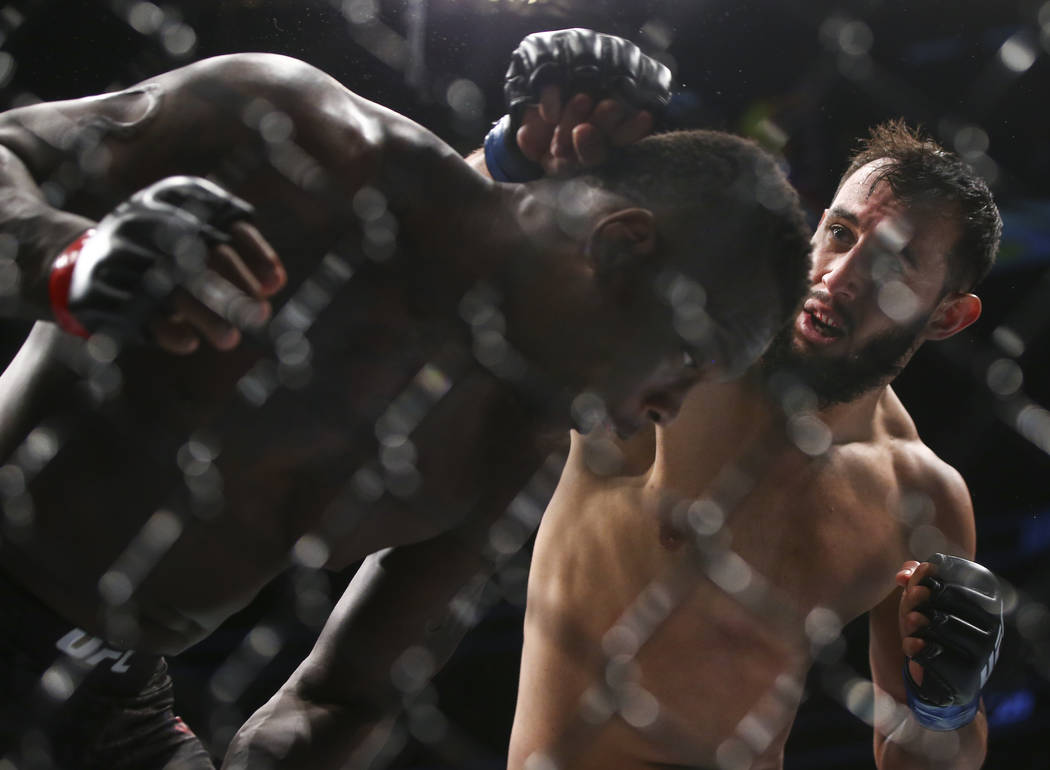Ovince Saint Preux, left, fights Dominick Reyes during their light heavyweight bout at UFC 229 at T-Mobile Arena in Las Vegas on Saturday, Oct. 6, 2018. Chase Stevens Las Vegas Review-Journal @css ...