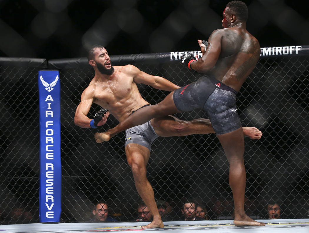 Dominick Reyes, left, takes a kick from Ovince Saint Preux during their light heavyweight bout at UFC 229 at T-Mobile Arena in Las Vegas on Saturday, Oct. 6, 2018. Chase Stevens Las Vegas Review-J ...