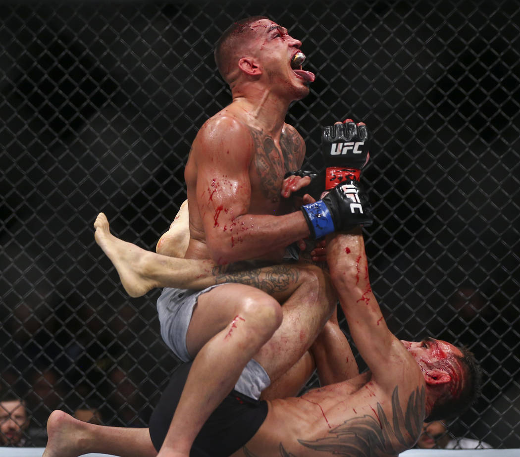 Anthony Pettis, above, keeps Tony Ferguson on the mat during their lightweight bout at UFC 229 at T-Mobile Arena in Las Vegas on Saturday, Oct. 6, 2018. Chase Stevens Las Vegas Review-Journal @css ...