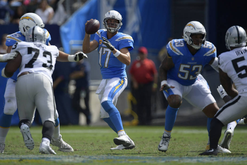 Chargers QB Rivers shreds Raiders defense with short passes
