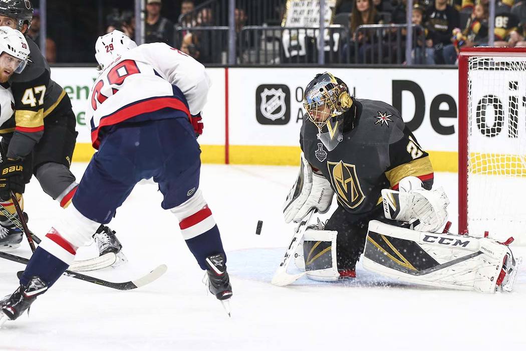 Golden Knights goaltender Marc-Andre Fleury (29) blocks a shot from Washington Capitals defenseman Christian Djoos (29) during the second period of Game 5 of the Stanley Cup Final at T-Mobile Aren ...