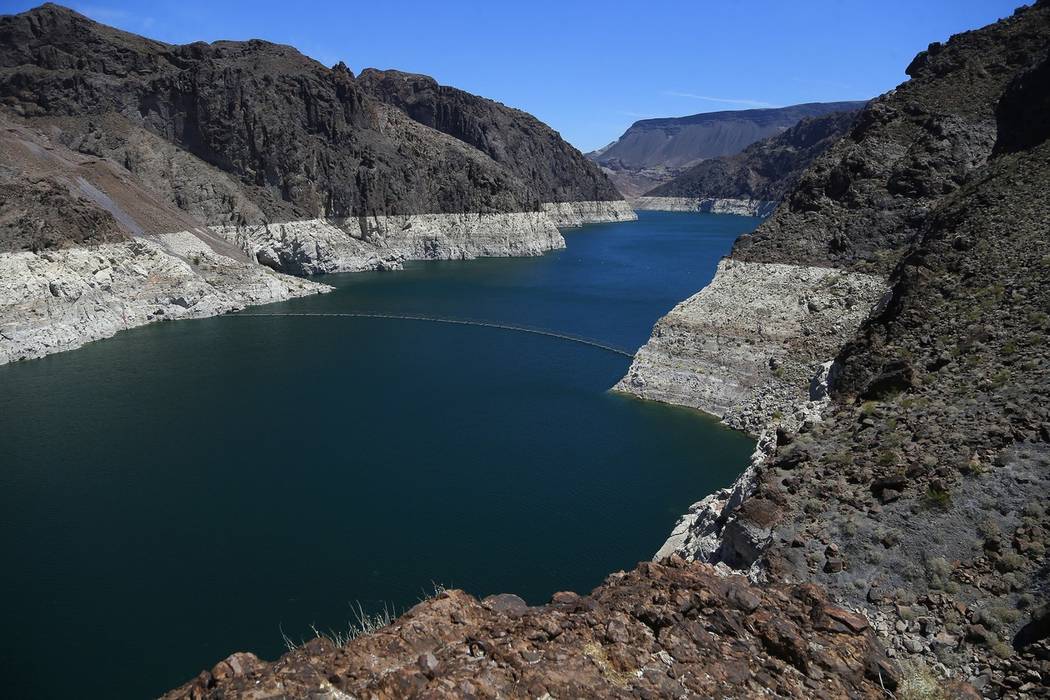 The low level of the water line is shown on the banks of the Colorado River near the Hoover Dam on May 31, 2018. (AP Photo/Ross D. Franklin)