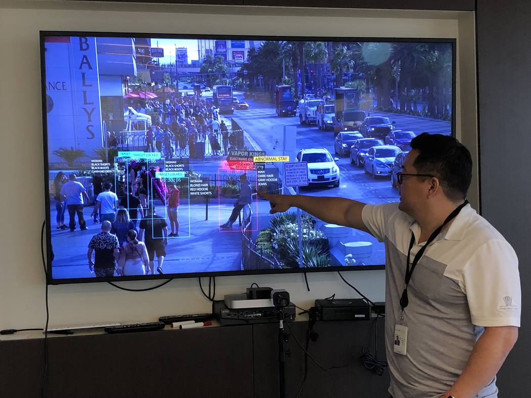 Shing Tao, CEO of Remake Holdings, shows off his facial recognition product applied to video shot on the Strip. (Todd Prince/Review-Journal)