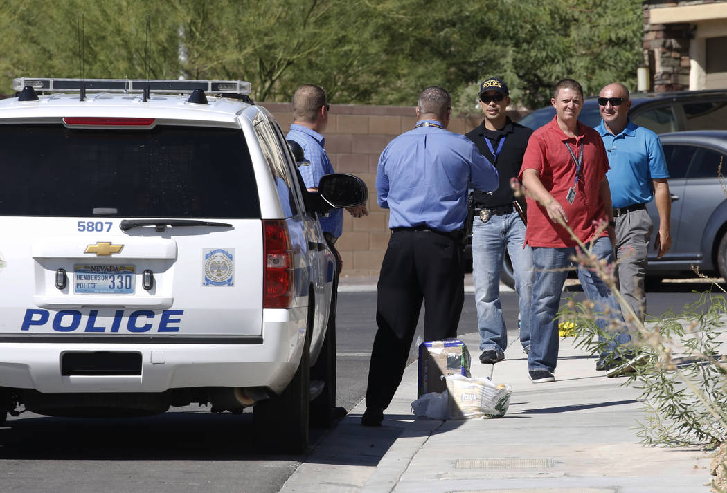 Henderson police investigate an officer-involved shooting in the 1500 block of Point Vista Avenue, near Patrick Lane and Whitney Ranch Drive, on Thursday, Sept. 13, 2018, in Henderson. (Bizuayehu ...