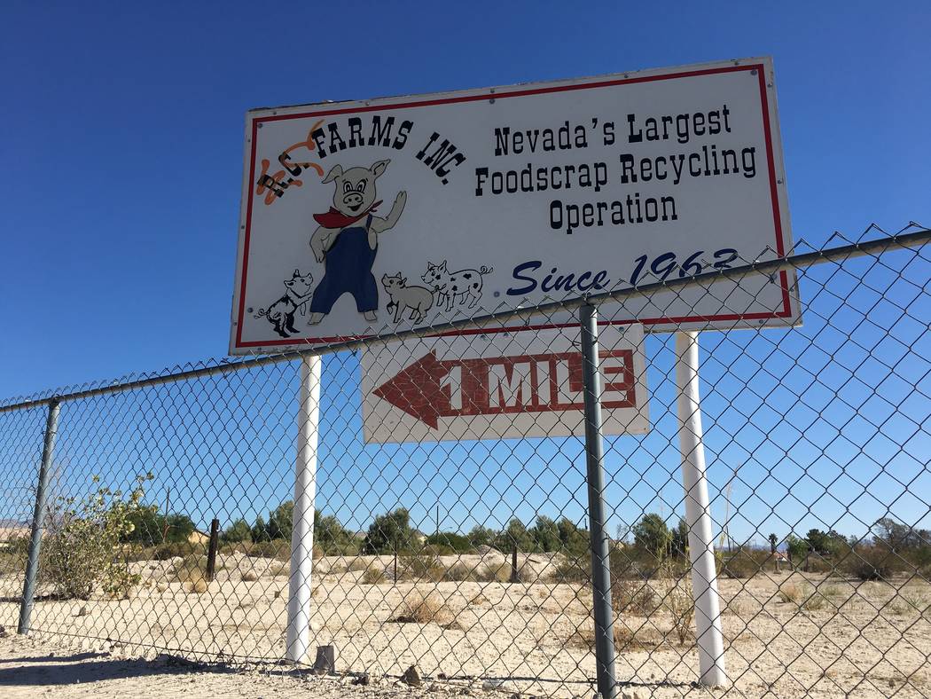 A sign for the closed R.C. Farms, a pig farm that was replaced by North Las Vegas' new Sedona Ranch community, is seen on North Fifth Street near Lone Mountain Road on Friday, Oct. 12, 2018. (Eli ...