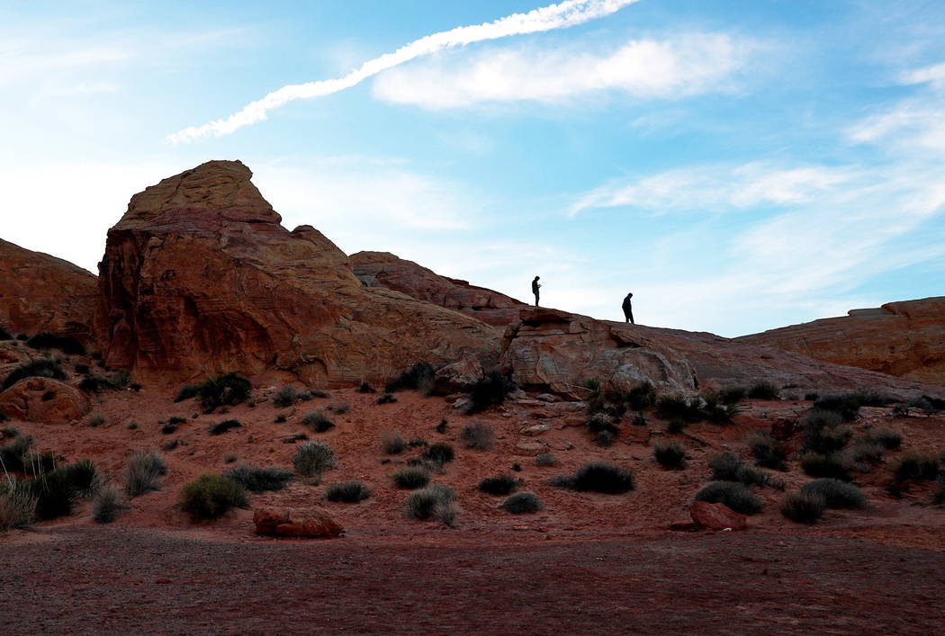 People soak in the view at the Valley of Fire State Park on Sunday in Overton, Nevada, Feb. 4, ...