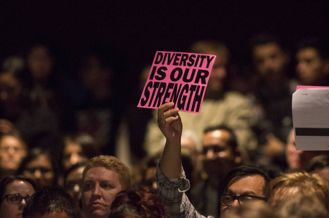 A gender-diverse proponent holds a sign during a special Clark County input meeting on a potential district gender-diverse policy at Valley High School in Las Vegas, Monday, Jan. 29, 2018. Richard ...