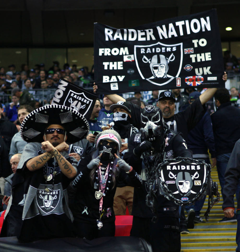 Oakland Raiders fans cheer during the first half of an NFL game against the Seattle Seahawks at Wembley Stadium in London, England, Sunday, Oct. 14, 2018. Heidi Fang Las Vegas Review-Journal @Heid ...