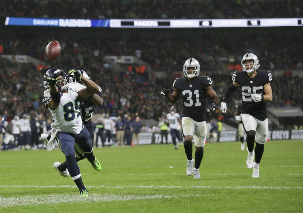 Seattle Seahawks wide receiver Doug Baldwin (89) stretches but fails to catch a pass during the first half of an NFL football game against Oakland Raiders at Wembley stadium in London, Sunday, Oct ...