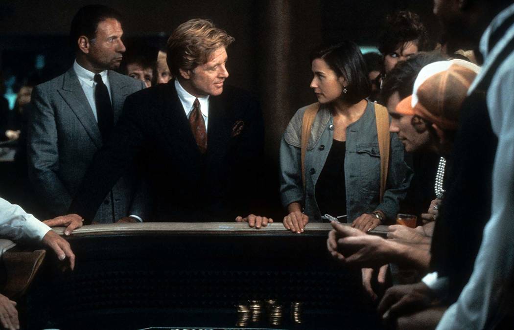 Robert Redford and Demi Moore hit the craps table at the Las Vegas Hilton during a scene from "Indecent Proposal." Photo by Paramount Pictures