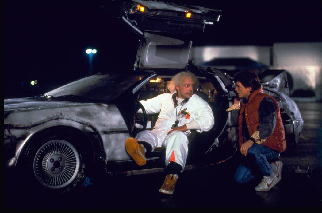 Christopher Lloyd, left, as Dr. Emmett Brown, and Michael J. Fox as Marty McFly in the 1985 film, "Back to the Future." A federal court has dismissed a lawsuit brought by the widow of automaker Jo ...