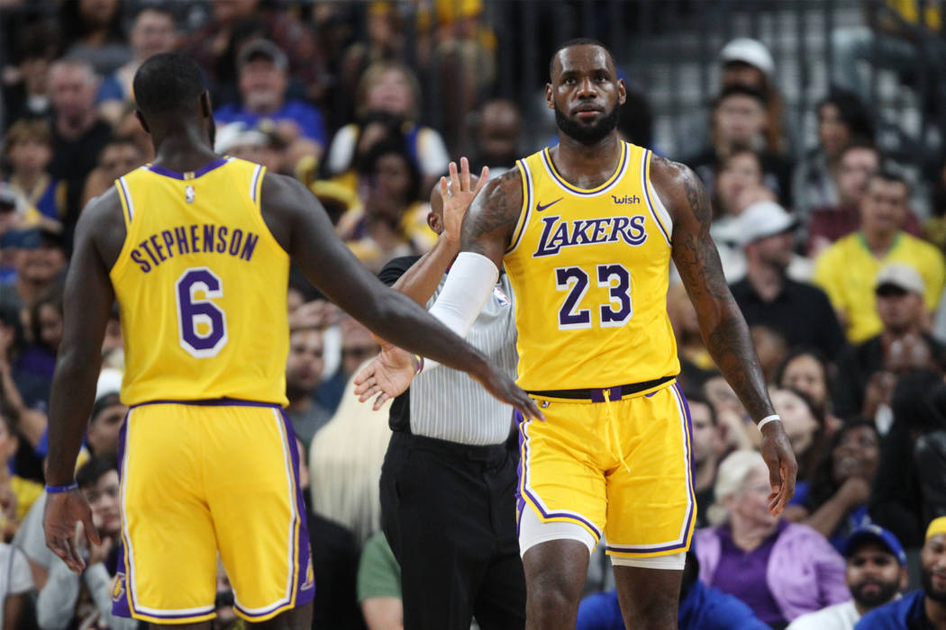 Los Angeles Lakers forward LeBron James (23) and guard Lance Stephenson (6) during their preseason game against the Golden State Warriors at T-Mobile Arena in Las Vegas, Wednesday, Oct. 10, 2018. ...