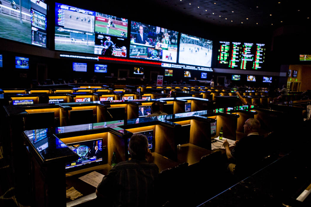 Sports betters watch games at the Green Valley Ranch sports book in Henderson on Thursday, April 26, 2018. Patrick Connolly Las Vegas Review-Journal