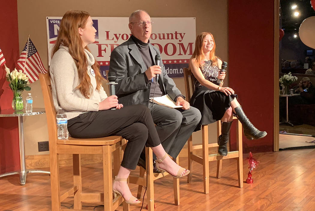 Chuck Muth, center, moderated a Q&A Thursday night in Mound House, Lyon County, with two legal sex workers on a possible move to ban legal prostitution in the county. "Ruby Rae," left, and "Alice ...