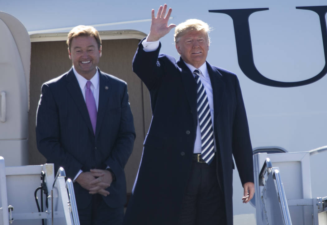President Donald Trump arrives with Sen. Dean Heller, R-Nev., on Air Force One before a Make America Great Again Rally in Elko, Nevada on Saturday, Oct. 20, 2018. Richard Brian Las Vegas Review-Jo ...
