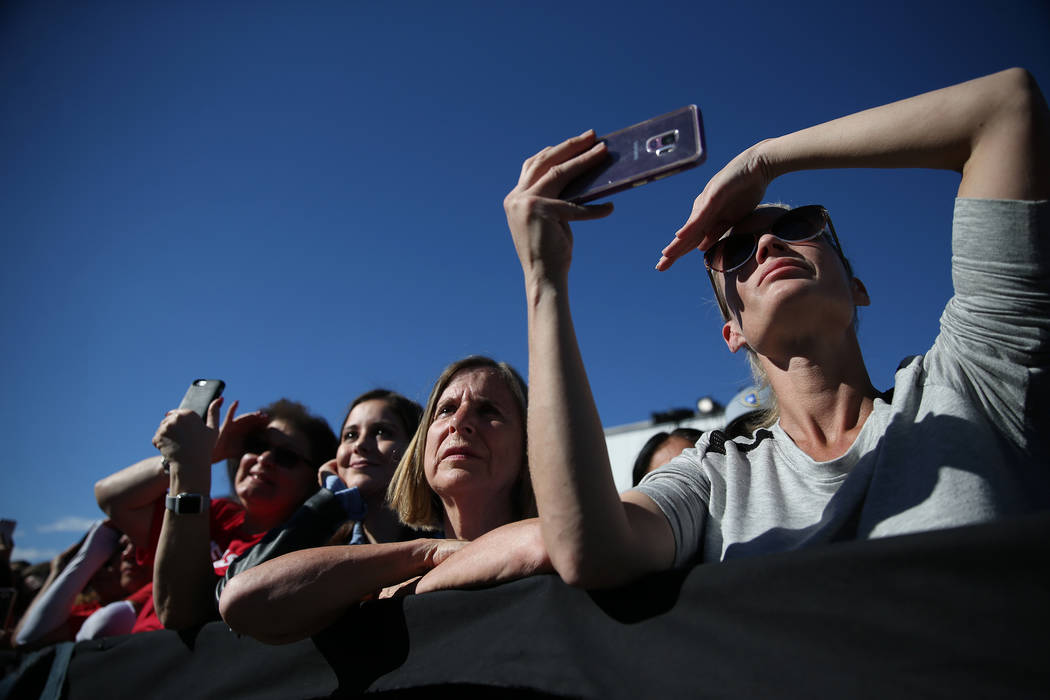 Attendees listen to former Vice President Joe Biden rally the crowd during a Nevada State Democratic Party rally to promote voting at the Culinary Workers Union Local 226 headquarters in Las Vegas ...