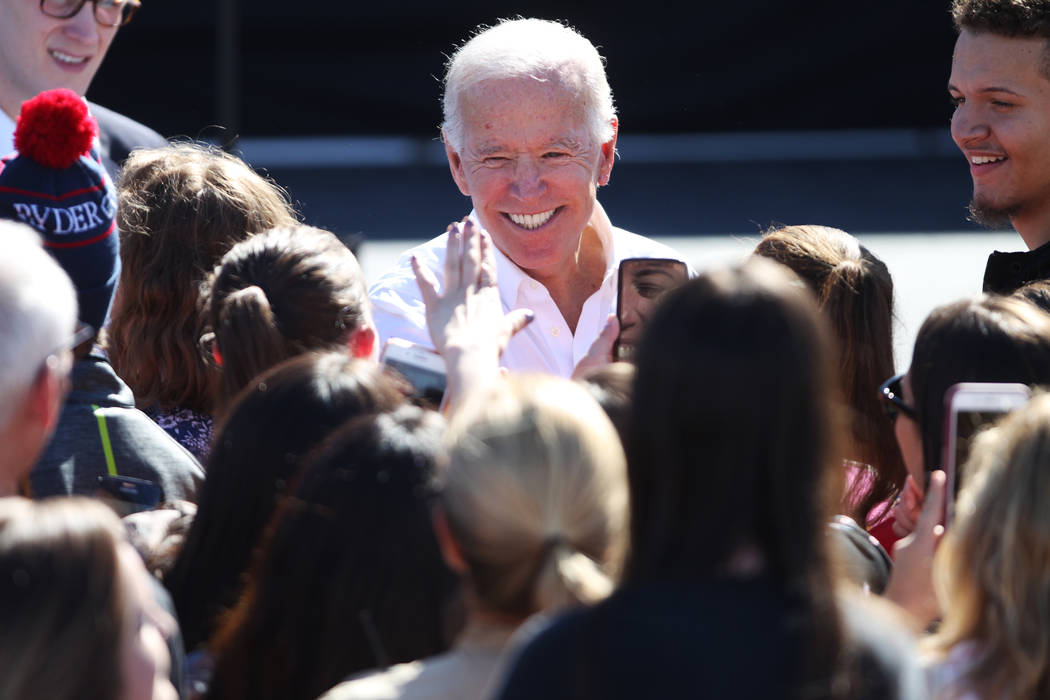 Former Vice President Joe Biden greets attendees during a Nevada State Democratic Party rally to promote voting at the Culinary Workers Union Local 226 headquarters in Las Vegas, Saturday, Oct. 20 ...