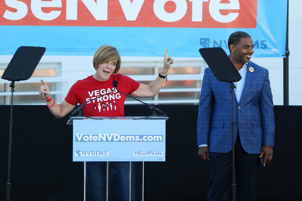 Democratic candidates for Congress Susie Lee, left, with Steven Horsford, speaks during a Nevada State Democratic Party rally to promote voting at the Culinary Workers Union Local 226 headquarters ...