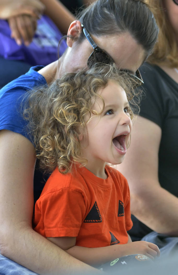 Arta Russell, 3, and her mother Melissa of Las Vegas watch singer-songwriter Lisa Loeb perform at the Las Vegas Book Festival at the Historic Fifth Street School at 401 S. 4th St. in Las Vegas on ...