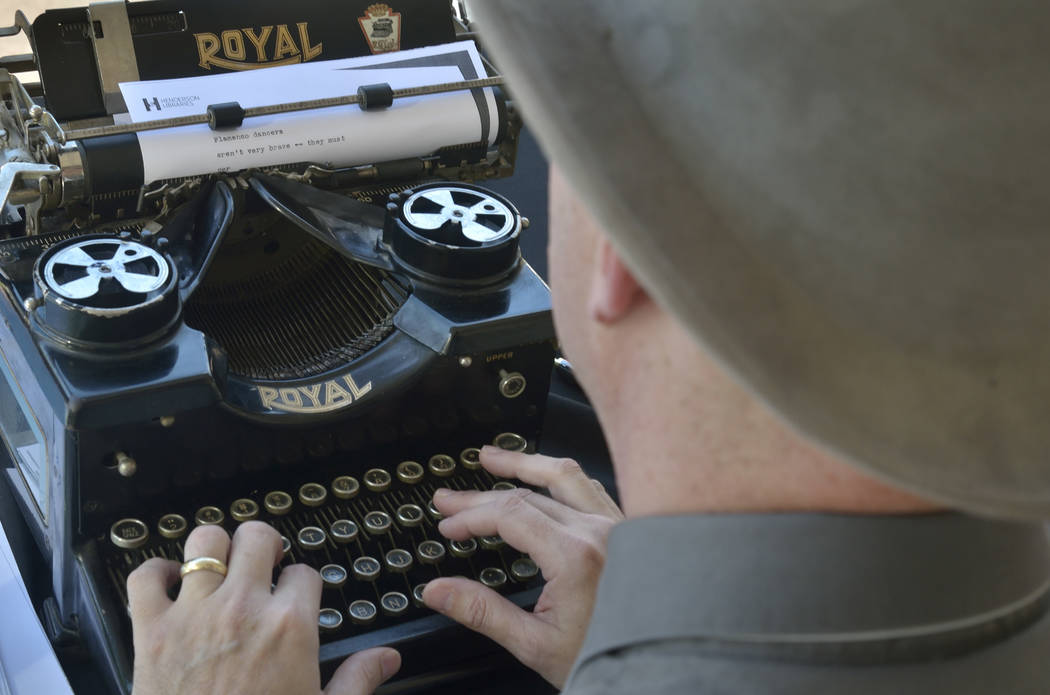 Author Sean Hoade works on a haiku on a 1940s-era Royal typewriter during the Las Vegas Book Festival at the Historic Fifth Street School at 401 S. 4th St. in Las Vegas on Saturday, Oct. 20, 2018. ...