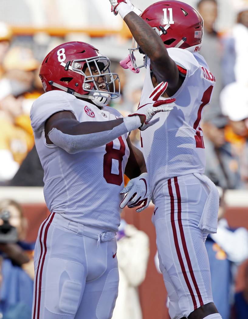 Alabama running back Josh Jacobs (8) celebrates a touchdown with teammate wide receiver Henry Ruggs III (11) in the first half of an NCAA college football game against Tennessee Saturday, Oct. 20, ...