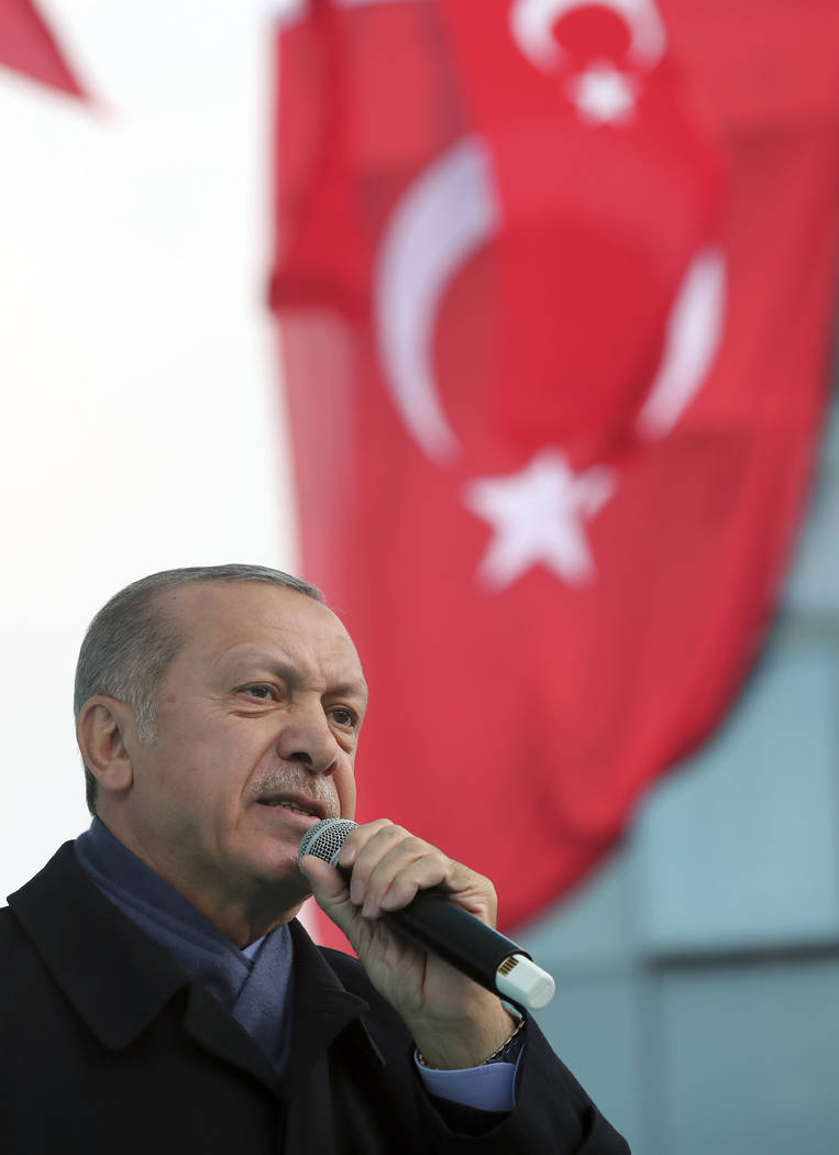 Turkish President Recep Tayyip Erdogan, delivers a speech at supporters in Istanbul, Sunday, Oct. 21, 2018. Erdogan says he will announce details of the Turkish investigation into the death of Sau ...