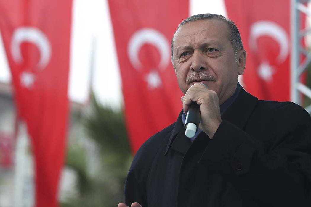 Turkish President Recep Tayyip Erdogan, delivers a speech at supporters in Istanbul, Sunday, Oct. 21, 2018. Erdogan says he will announce details of the Turkish investigation into the death of Sau ...