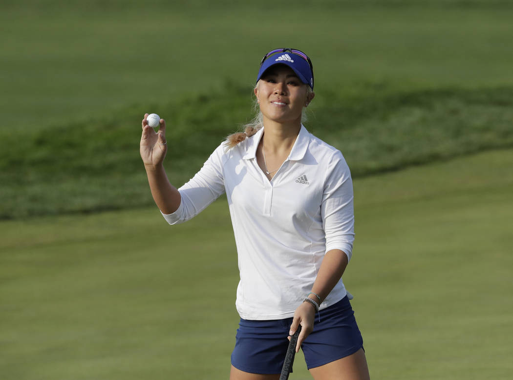 Danielle Kang of the United States reacts on the 18th hole after finishing the final round of the LPGA KEB Hana Bank Championship at Sky72 Golf Club in Incheon, South Korea, Sunday, Oct. 14, 2018. ...