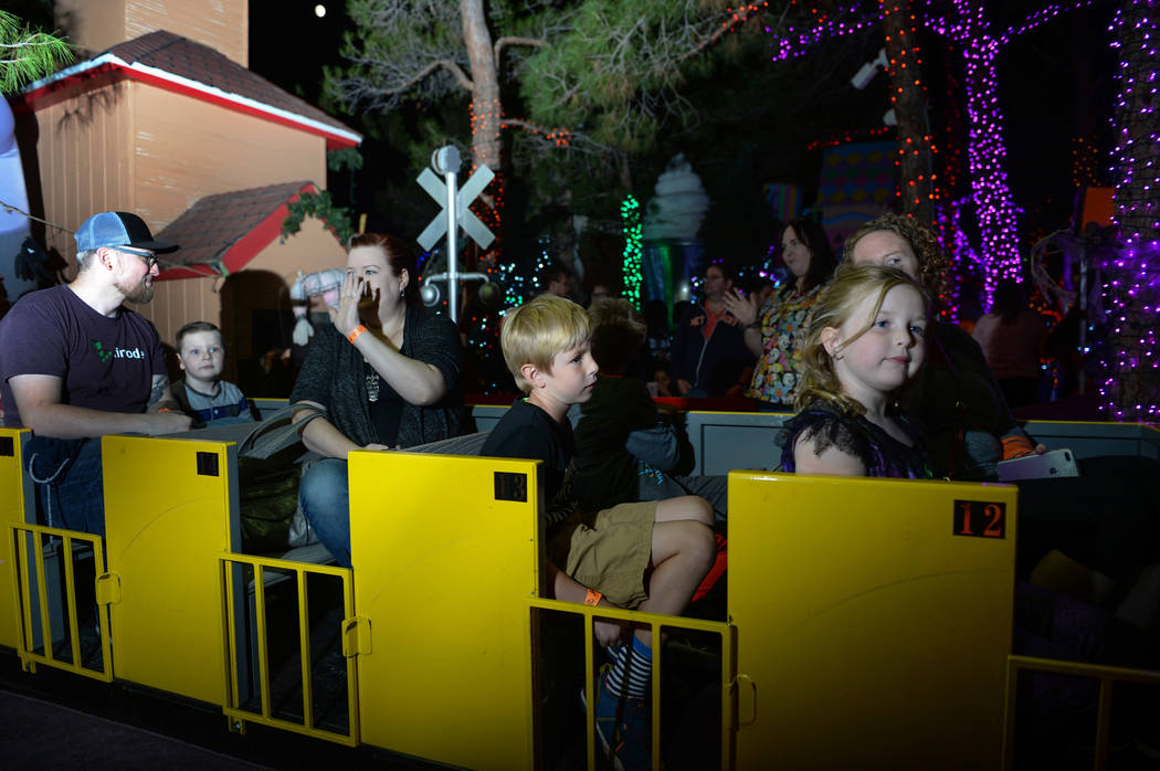Visitors gathered for HallOVween at Opportunity Village's Magical Forest ride a train through the grounds in Las Vegas, Sunday, Oct. 21, 2018. Caroline Brehman/Las Vegas Review-Journal