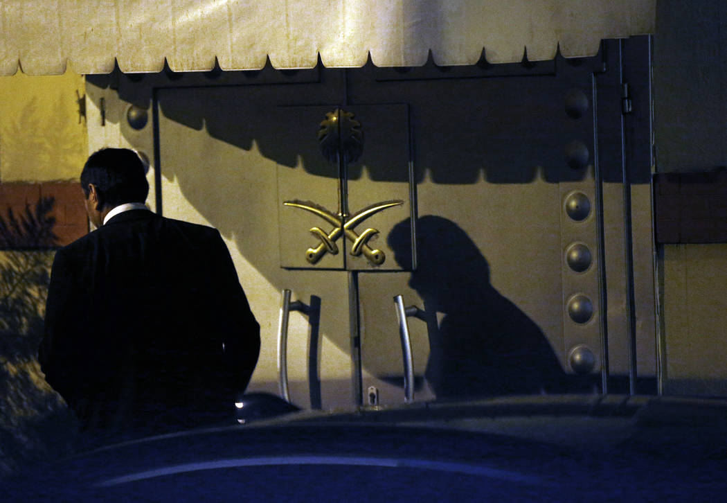 A man leaves Saudi Arabia's consulate in Istanbul, Friday, Oct. 19, 2018. A Turkish official said Friday that investigators are looking into the possibility that missing Saudi journalist Jamal Kh ...