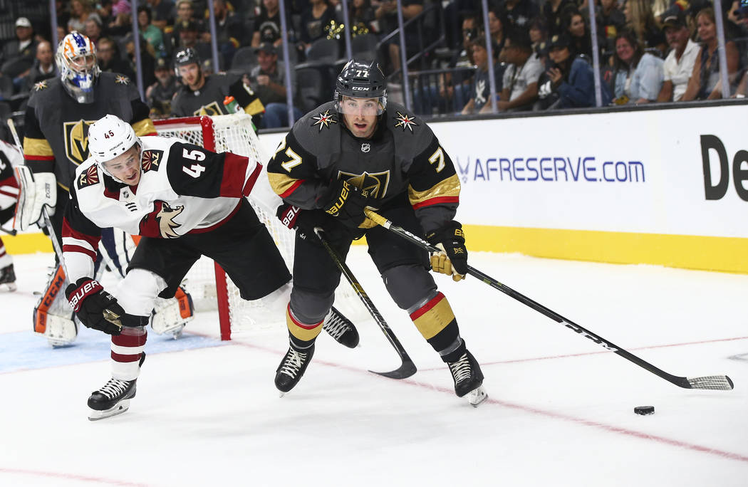 Golden Knights defenseman Brad Hunt (77) goes for the puck during the second period of a preseason NHL hockey game against the Arizona Coyotes at T-Mobile Arena in Las Vegas on Sunday, Sept. 16, 2 ...