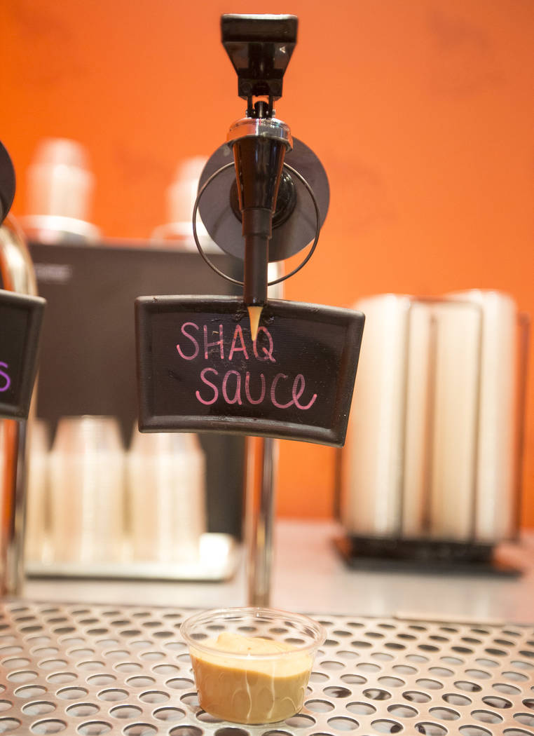 A side of the Shaq Sauce at the sauce bar during the grand opening celebration of Big Chicken, Shaquille O'Neal's new fast-casual chicken restaurant located at 4480 Paradise Road in Las Vegas on T ...