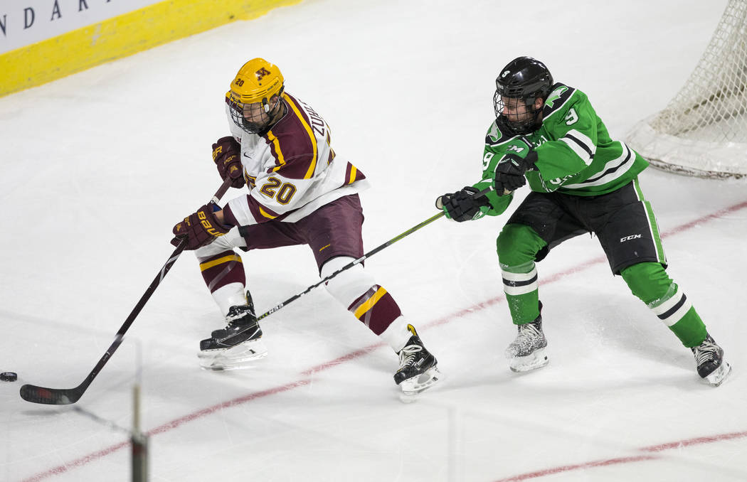 North Dakota clips rival Minnesota before rowdy hockey crowd