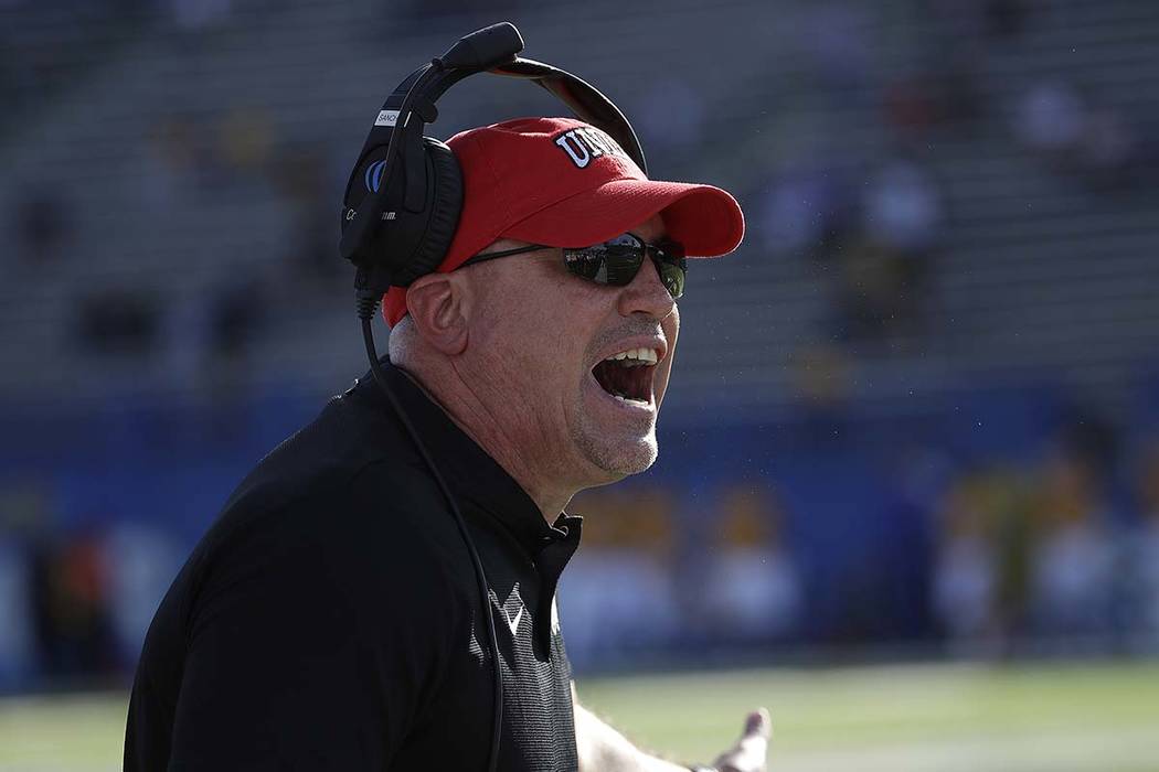 UNLV head coach Tony Sanchez yells toward officials during the first half of an NCAA college football game against San Jose State in San Jose, Calif., Saturday, Oct. 27, 2018. (AP Photo/Jeff Chiu)