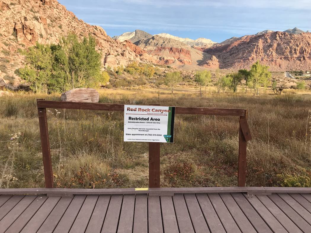 A sign warns visitors about the closure of the Red Spring boardwalk at Red Rock Canyon National Conservation Area on Oct. 29. (Henry Brean/Las Vegas Review-Journal)