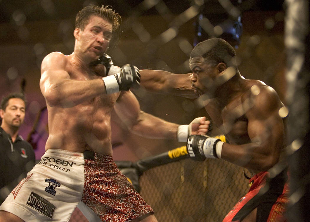 RJ FILE*** LOCAL - Rashad Evans lands a right to Stephan Bonnar in the second round of their Ultimate Fighting Champtionship light heavyweight bout at the Hard Rock Hotel Wednesday, June 28, 2006. ...