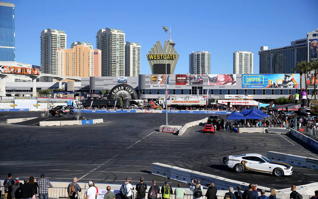Cars perform at the Ford Out Front performance demonstration track at the Specialty Equipment Market Show at the Las Vegas Convention Center Wednesday, Oct. 31, 2018. The SEMA Show 2018 runs throu ...